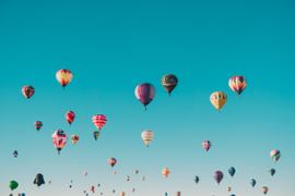 Balloons in the sky.