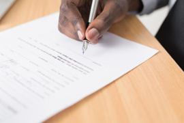 Signing a law.