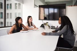 A bunch of people at a job interview.