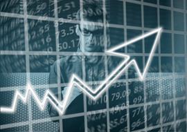 financial-graph-going-up-businessman-in-background