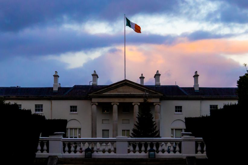 irish-flag-on-a-pole-on-top-of-a-building