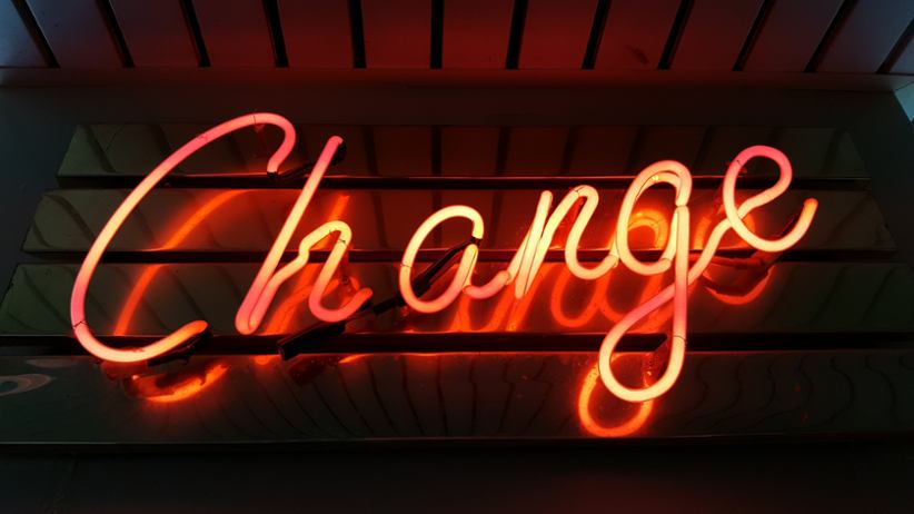 neon-sign-with-word-change