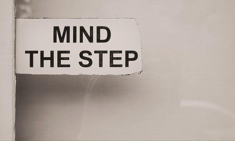 Mind this step warning sign.