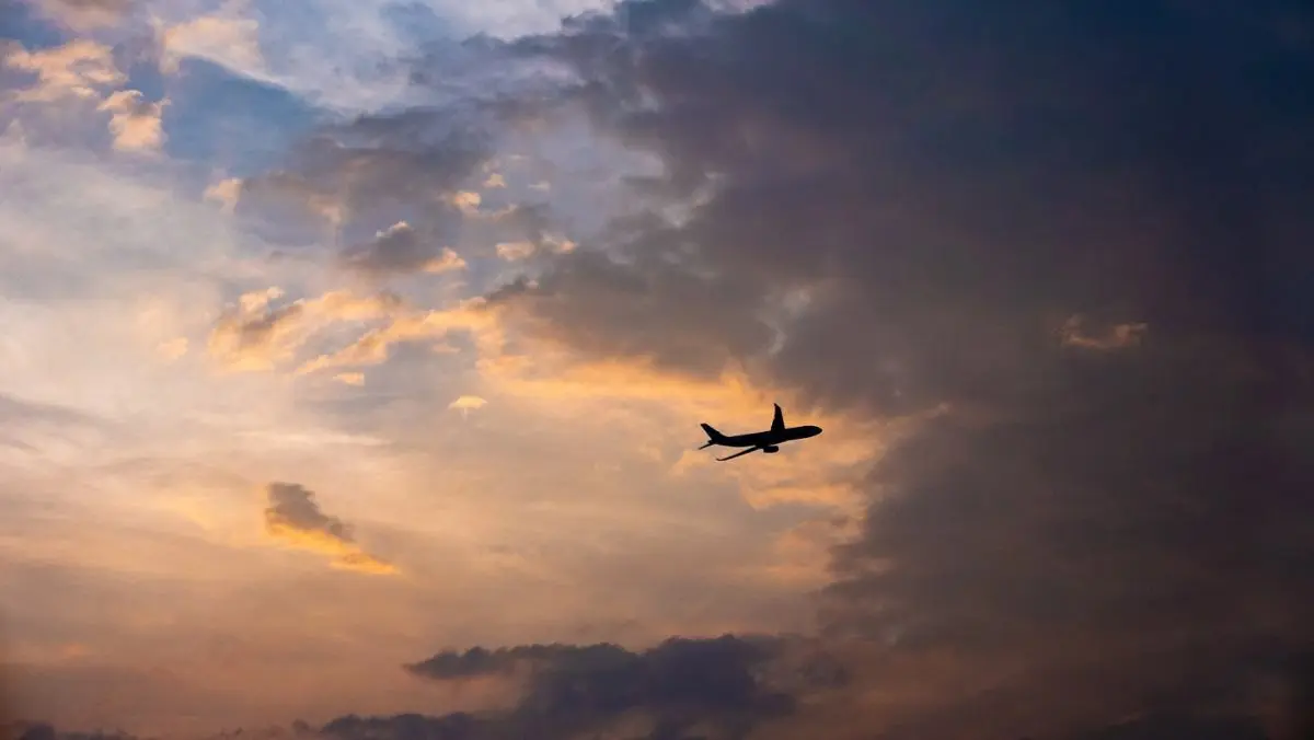 A plane flying in the sky.