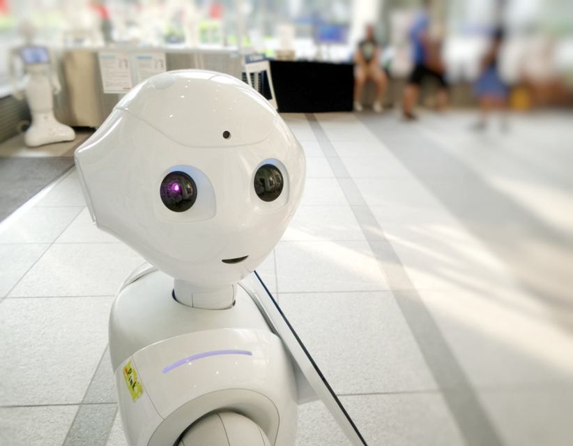 An AI robot welcoming people.