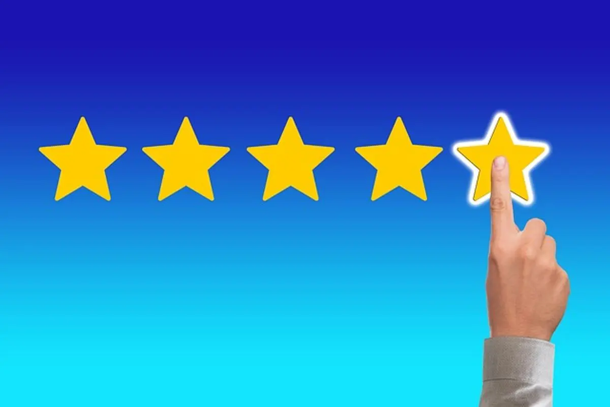 businessman-pointing-at-five-stars