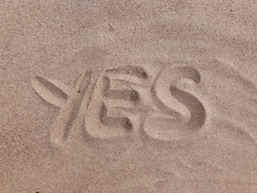 A Yes sign in the sand.