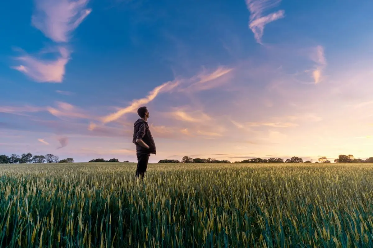 A man looking at the horizon.