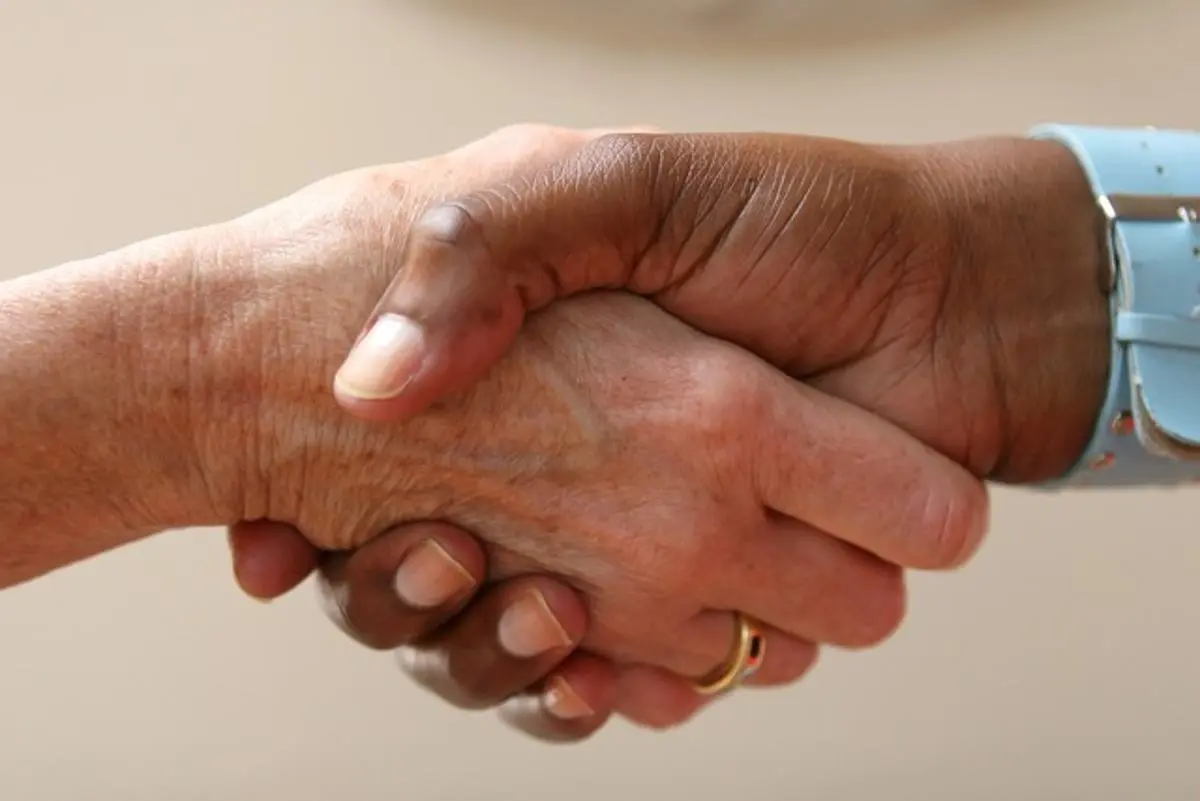 two-people-shaking-hands