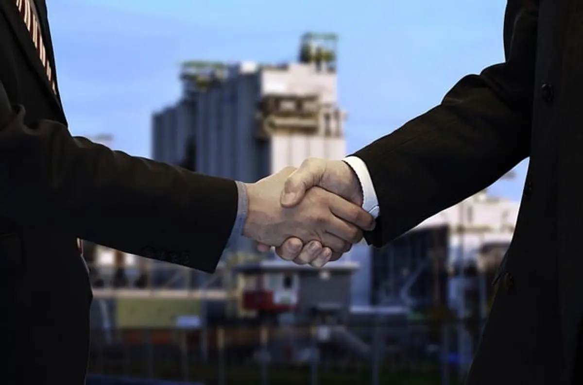 two-businessmen-shaking-hands