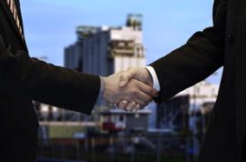 two-businessmen-shaking-hands