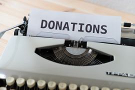 typewriter-donation-word-on-piece-of-paper