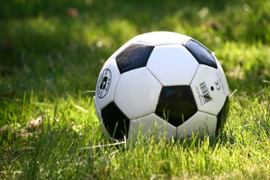 soccer-ball-on-green-field