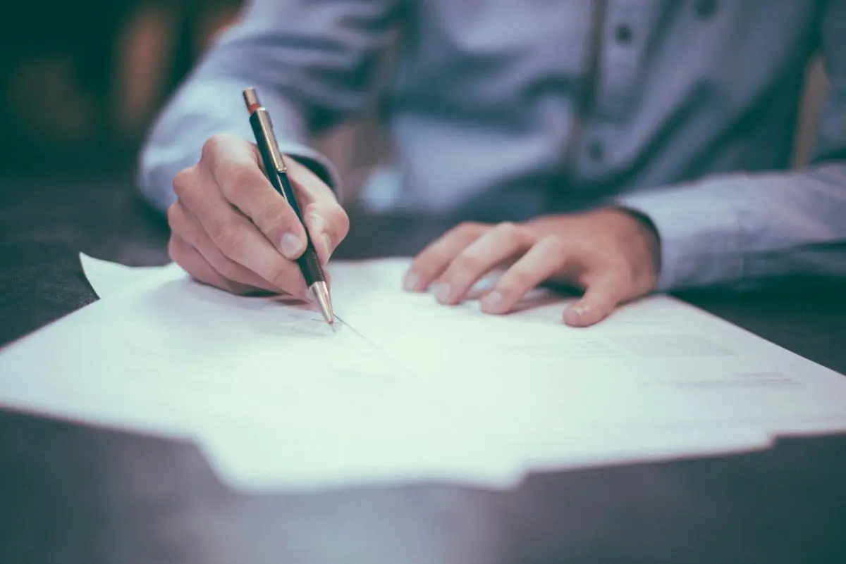 A person signing a bill