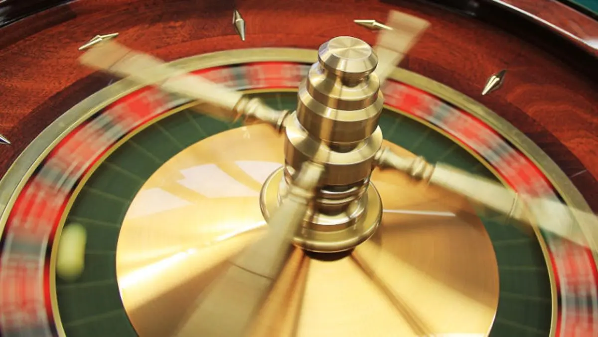 A roulette wheel spinning fast.