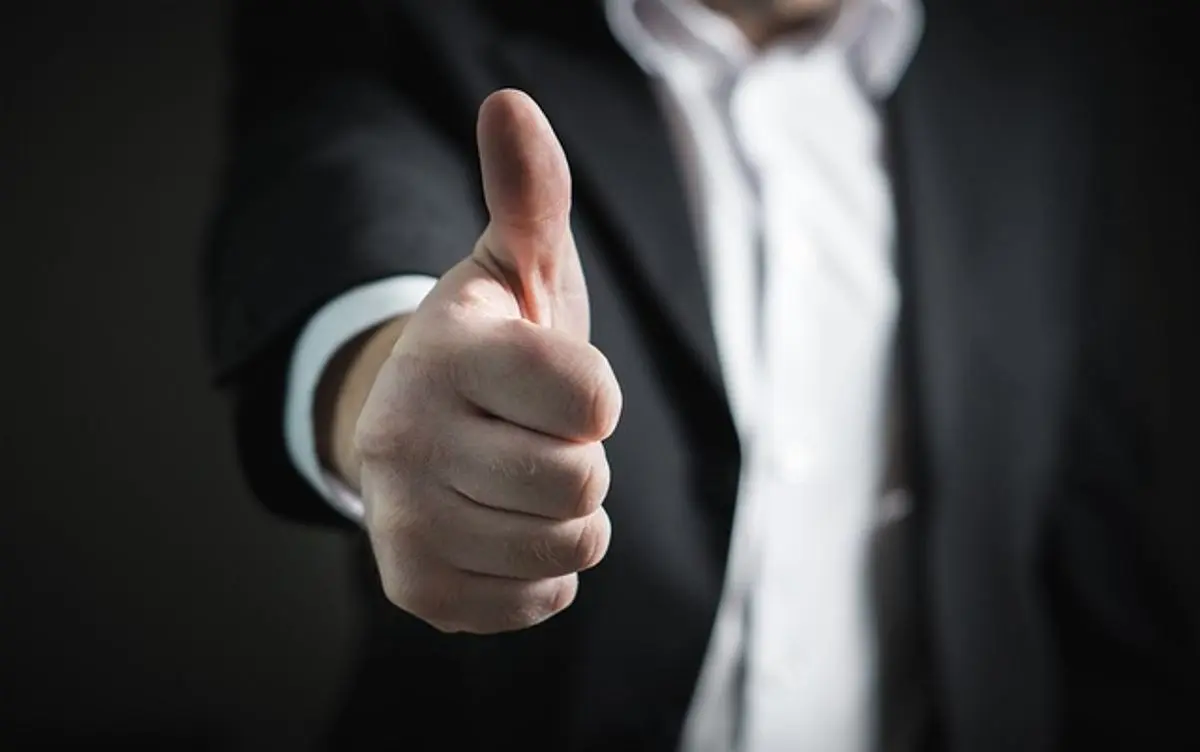 businessman-holding-a-thumb-up