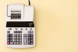 A calculator and tax machine
