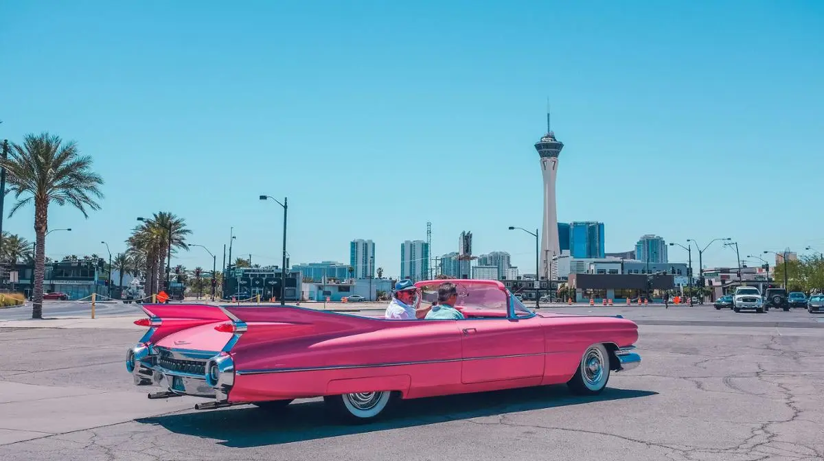 retro-pink-car-with-las-vegas-in-background